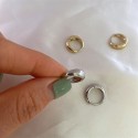 French retro matte lava texture spiral earrings with a niche high-end feel, light luxury and exquisite antique silver needles Earrings for women